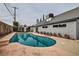 Inviting kidney-shaped pool with surrounding patio at 5129 Del Monte Ave, Las Vegas, NV 89146