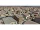 Aerial view of house in a large neighborhood at 521 Abrazar Ave, North Las Vegas, NV 89081