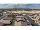 Aerial view showcasing house and distant mountain views at 521 Abrazar Ave, North Las Vegas, NV 89081