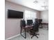 Bedroom with a workspace and plenty of natural light at 521 Abrazar Ave, North Las Vegas, NV 89081