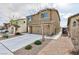 Two-story house with a two-car garage and landscaping at 521 Abrazar Ave, North Las Vegas, NV 89081