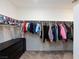 Large walk-in closet with ample hanging space and shelving at 521 Abrazar Ave, North Las Vegas, NV 89081