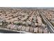 Aerial view of a large residential community with numerous houses and roads at 5233 Fiery Sky Ridge St, Las Vegas, NV 89148