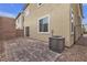 Small paved backyard with AC unit at 5233 Fiery Sky Ridge St, Las Vegas, NV 89148