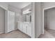 Double vanity bathroom with tile flooring at 5233 Fiery Sky Ridge St, Las Vegas, NV 89148