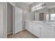 Double vanity bathroom with separate toilet area at 5233 Fiery Sky Ridge St, Las Vegas, NV 89148