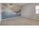 Bedroom with dinosaur mural and neutral decor at 5233 Fiery Sky Ridge St, Las Vegas, NV 89148