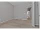 Neutral bedroom featuring carpet and access to other rooms at 5233 Fiery Sky Ridge St, Las Vegas, NV 89148