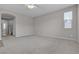 Living room with neutral walls and carpet flooring at 5233 Fiery Sky Ridge St, Las Vegas, NV 89148