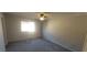 Bedroom with carpeted floors and ceiling fan at 5576 W Rochelle Ave # 25C, Las Vegas, NV 89103