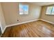 Bedroom featuring hardwood floors, and a window showcasing the outside at 624 D Ave, Boulder City, NV 89005