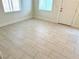 Living room with tile floors and neutral walls at 624 D Ave, Boulder City, NV 89005