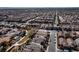 Aerial view of a single Gathering home in a quiet cul-de-sac neighborhood at 6420 Birdcall St, North Las Vegas, NV 89084