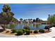 Landscaped pond in a community with playground and walking paths at 6420 Birdcall St, North Las Vegas, NV 89084