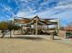 Covered playground with play structures at 6420 Birdcall St, North Las Vegas, NV 89084