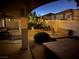 Inviting backyard with a hot tub and patio seating at 656 Hidden Cellar Ct, Las Vegas, NV 89183