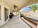 Covered patio with hot tub, outdoor seating, and fitness area at 656 Hidden Cellar Ct, Las Vegas, NV 89183