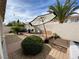 Relaxing backyard oasis with hot tub, patio furniture, and hammock at 656 Hidden Cellar Ct, Las Vegas, NV 89183