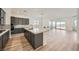 Stylish kitchen with a large island, stainless steel appliances, and modern cabinetry in an open-concept layout at 66 Ibiza Lake Dr, Henderson, NV 89011