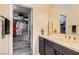 Bathroom with double vanity and walk-in closet at 685 Viale Machiavelli Ln, Henderson, NV 89011