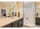 Double vanity bathroom with walk in shower at 685 Viale Machiavelli Ln, Henderson, NV 89011