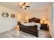 Bright bedroom with ensuite bathroom and ceiling fan at 685 Viale Machiavelli Ln, Henderson, NV 89011