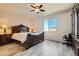 Spacious bedroom with ceiling fan and large bed at 685 Viale Machiavelli Ln, Henderson, NV 89011