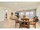 Dining area with round table and chairs, open to living area at 685 Viale Machiavelli Ln, Henderson, NV 89011