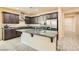 Modern kitchen with stainless steel appliances and granite countertops at 685 Viale Machiavelli Ln, Henderson, NV 89011