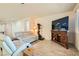 Spacious living room with beige walls and wood flooring at 685 Viale Machiavelli Ln, Henderson, NV 89011