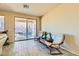 Relaxing living room featuring sliding glass doors to backyard at 685 Viale Machiavelli Ln, Henderson, NV 89011