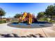 Community playground with slides and climbing structures at 685 Viale Machiavelli Ln, Henderson, NV 89011