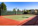 Well-maintained tennis court with surrounding fence at 685 Viale Machiavelli Ln, Henderson, NV 89011