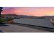 Stunning sunset view from backyard, showcasing mountain and community views at 7230 Galaxy Dune St, Las Vegas, NV 89148