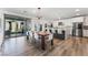 Open concept dining area with sliding glass doors to backyard at 7230 Galaxy Dune St, Las Vegas, NV 89148