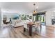 Bright dining area with wooden table and access to backyard at 7230 Galaxy Dune St, Las Vegas, NV 89148