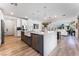 Open concept kitchen with farmhouse sink and island at 7230 Galaxy Dune St, Las Vegas, NV 89148