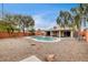 Large backyard with kidney shaped pool at 7232 Raincloud Dr, Las Vegas, NV 89145