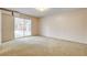 Bedroom with carpet, sliding door to patio, and pool view at 7232 Raincloud Dr, Las Vegas, NV 89145