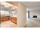 View of kitchen and living room from hallway at 7232 Raincloud Dr, Las Vegas, NV 89145