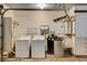 Laundry room with washer, dryer, and water heater at 7232 Raincloud Dr, Las Vegas, NV 89145