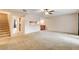 View of staircase and living room from kitchen at 7232 Raincloud Dr, Las Vegas, NV 89145