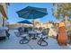 Relaxing backyard patio with seating area and fire pit at 7528 Stray Horse Ave, Las Vegas, NV 89113