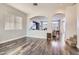 Bright living room featuring wood floors, stylish furniture and neutral paint at 7528 Stray Horse Ave, Las Vegas, NV 89113