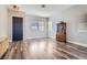 Inviting living room featuring wood floors, stylish furniture and neutral paint at 7528 Stray Horse Ave, Las Vegas, NV 89113