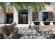 Front entrance with modern door, stone veneer, and landscape at 78 Hawk Ridge Dr, Las Vegas, NV 89135