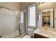 Clean bathroom with a shower/tub combo and modern vanity at 821 Barrhead Ave, Henderson, NV 89012