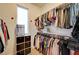 Well-organized closet with hanging rods and storage drawers at 821 Barrhead Ave, Henderson, NV 89012