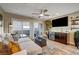 Relaxing game room with sectional sofa, wet bar, and TV at 821 Barrhead Ave, Henderson, NV 89012