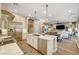 Modern kitchen with stainless steel appliances and large island at 821 Barrhead Ave, Henderson, NV 89012